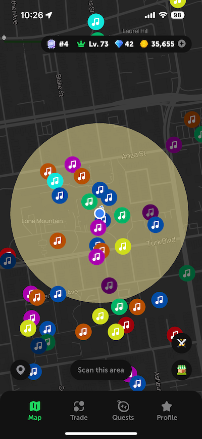 screenshot of an ios game where colorful circles can be opened for songs